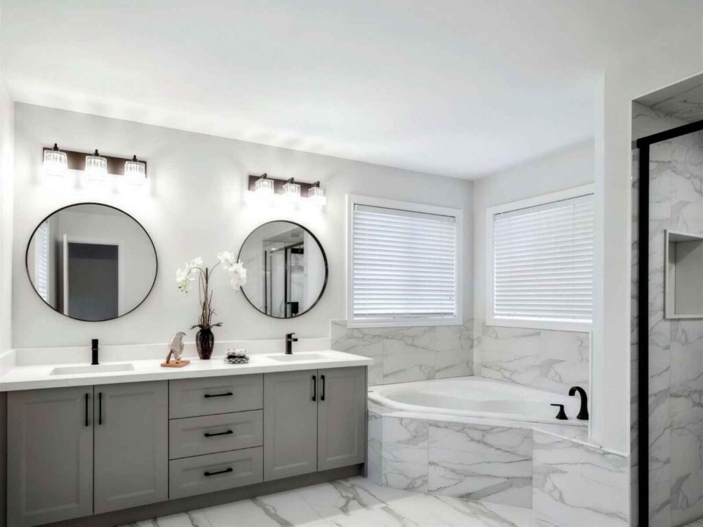 Bathroom renovations Toronto project with marble tile and double vanity