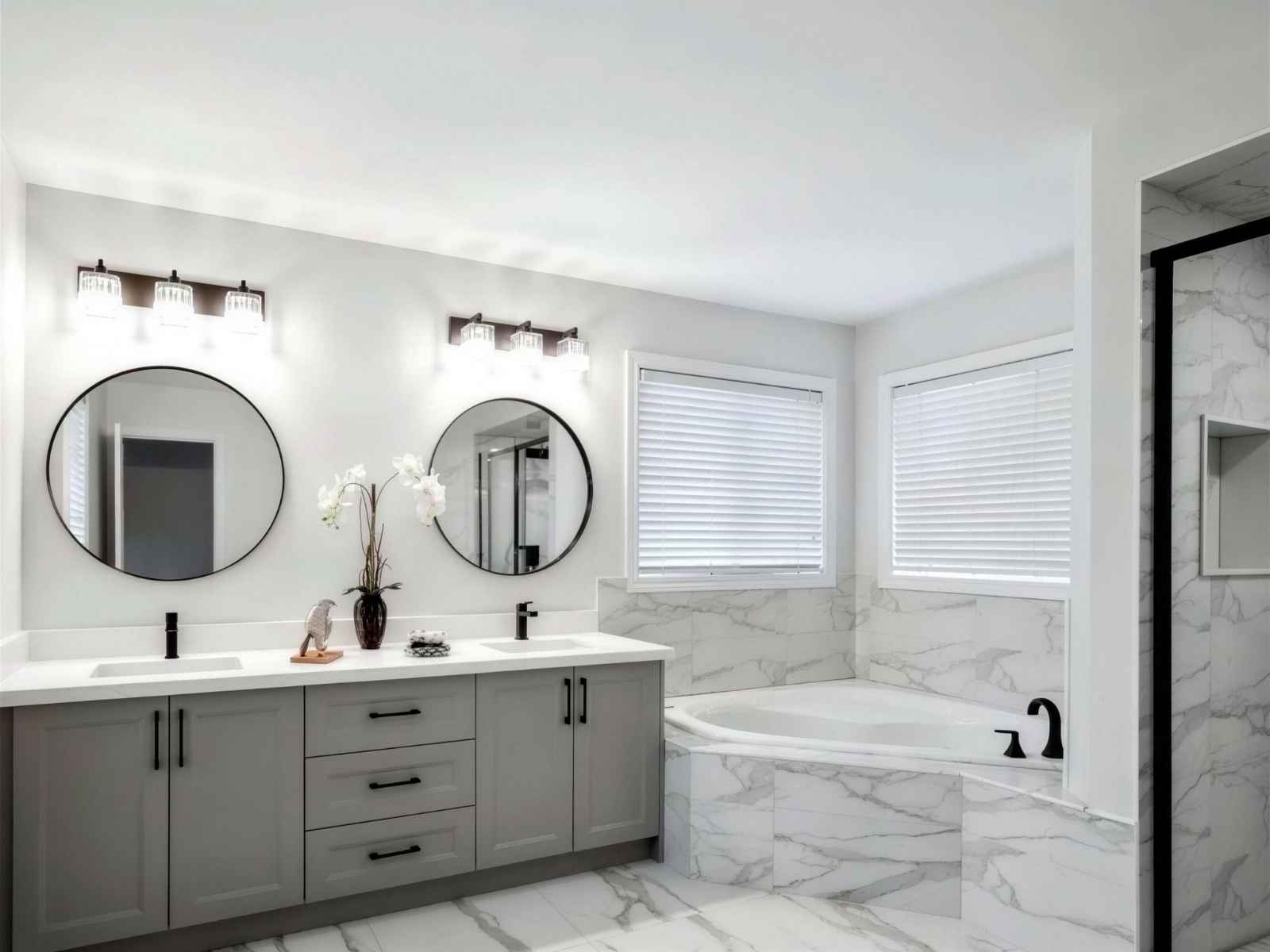 Bathroom renovation with marble tile shower and double vanity